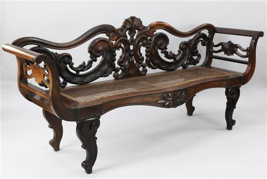An Anglo Indian hardwood settee, W.6ft 10in. D.1ft 8in. H.3ft 2in.